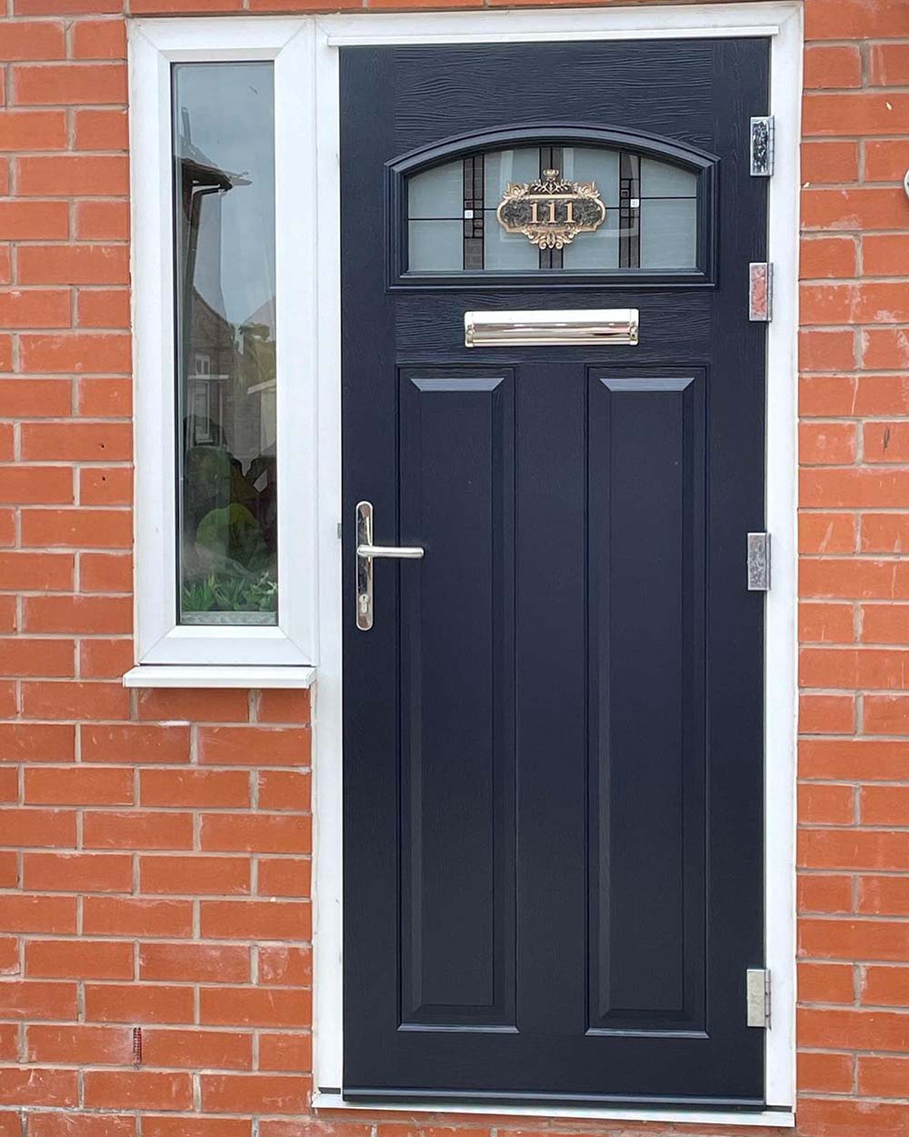 Front door after being sprayed black