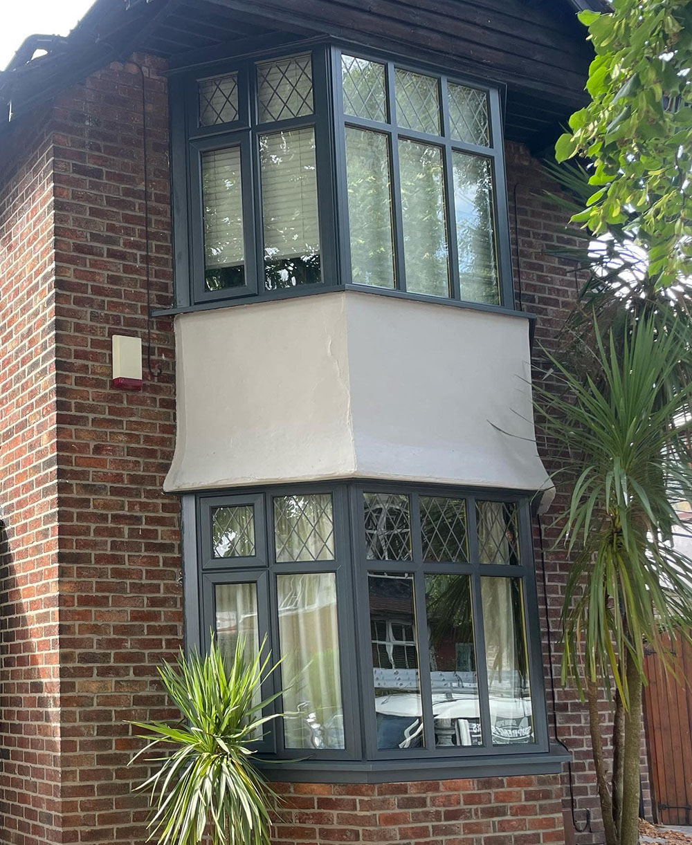 Bay windows of a house Sprayed black