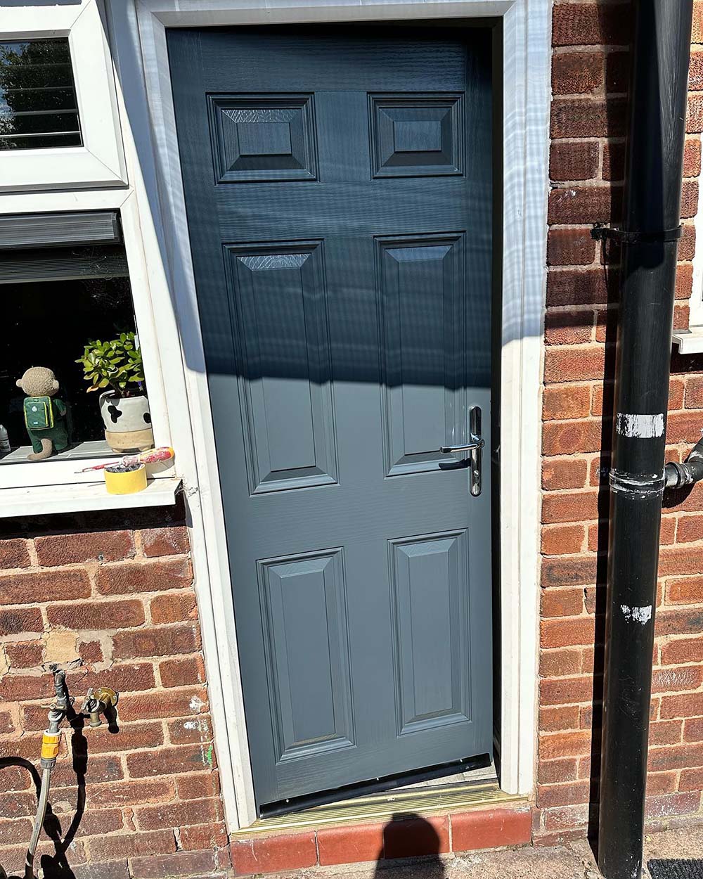 Front door after being sprayed anthracite grey